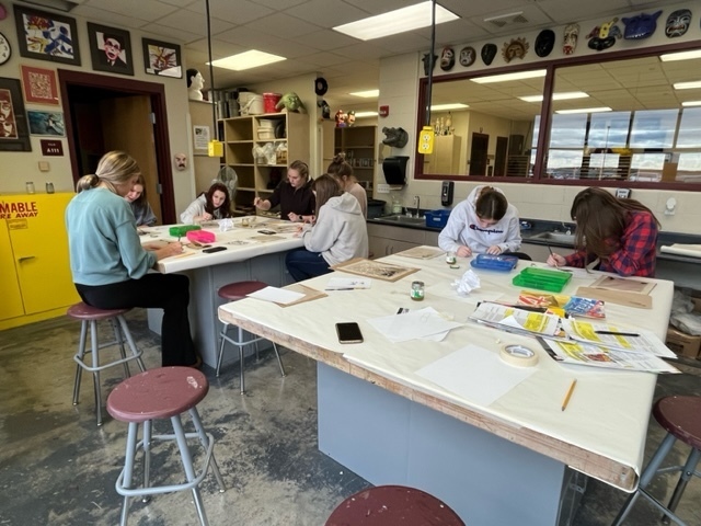 Students working on oil painting projects